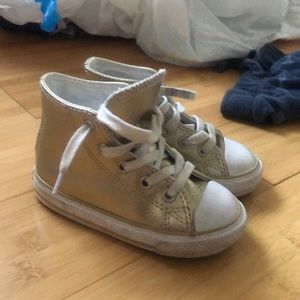 Gold high top converse